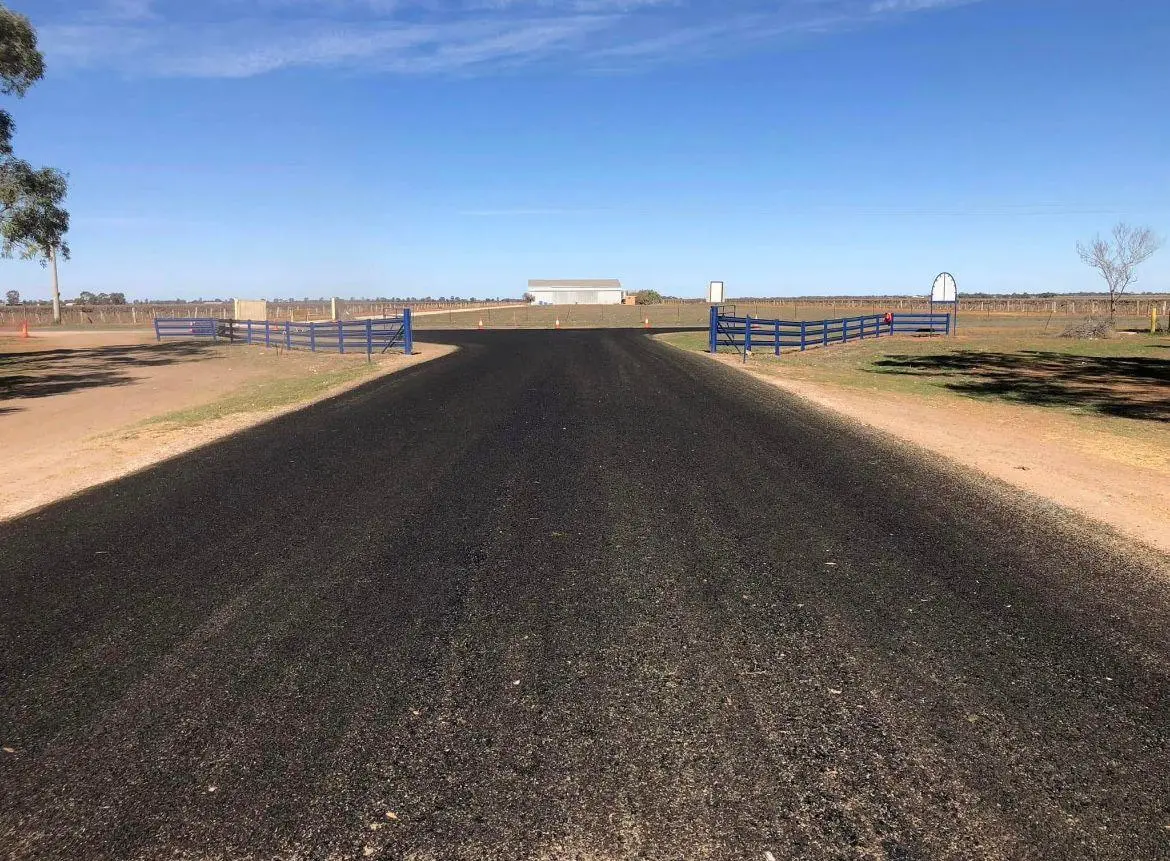 Fresh black asphalt road project in Perth WA
