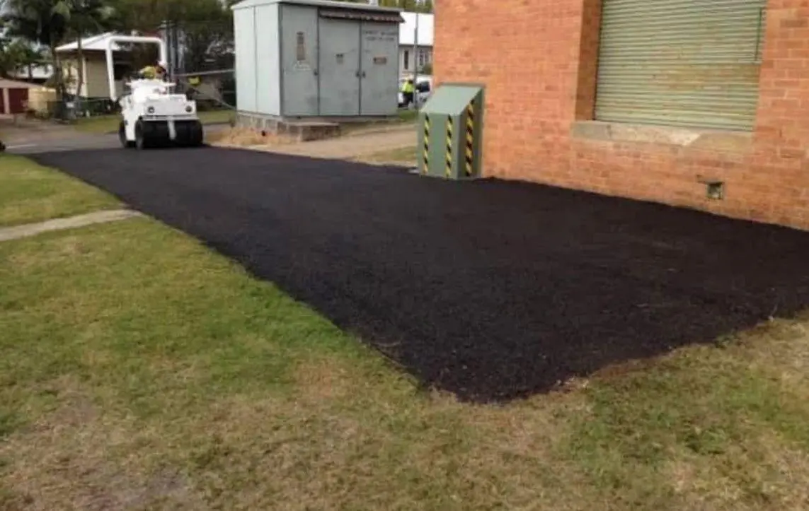 New asphalt driveway installed beside home WA