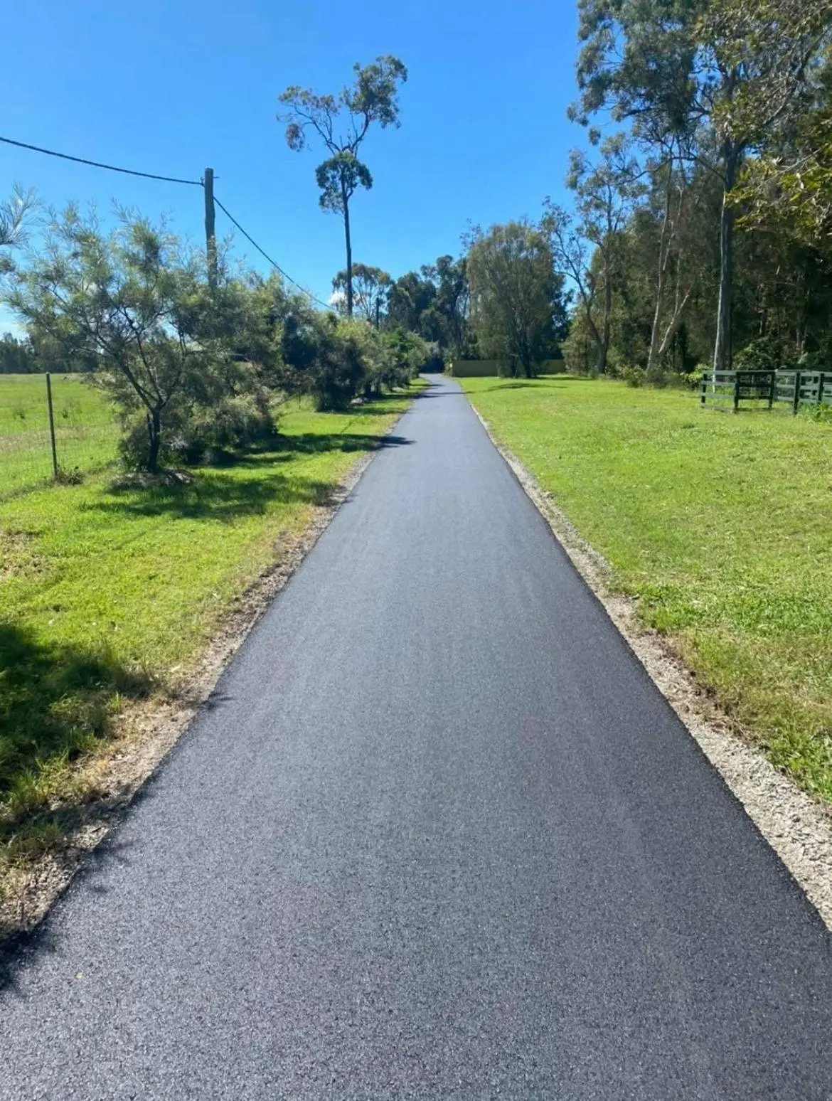 Fresh asphalt road in residential Perth area