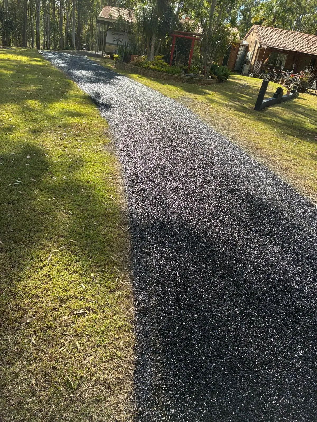 Rural asphalt driveway installation in Perth